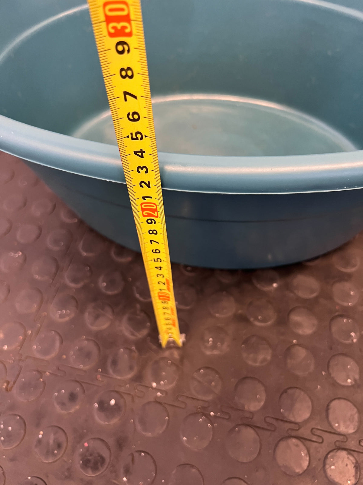 Spacious Turquoise Plastic Utility Tub with Minor Scratches