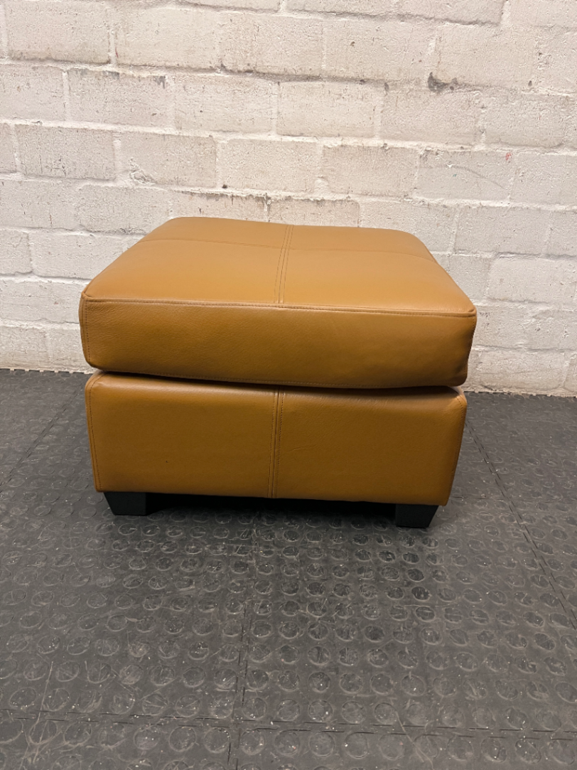 Square Tan Upholstered Ottoman with Block Feet — Good Used Condition