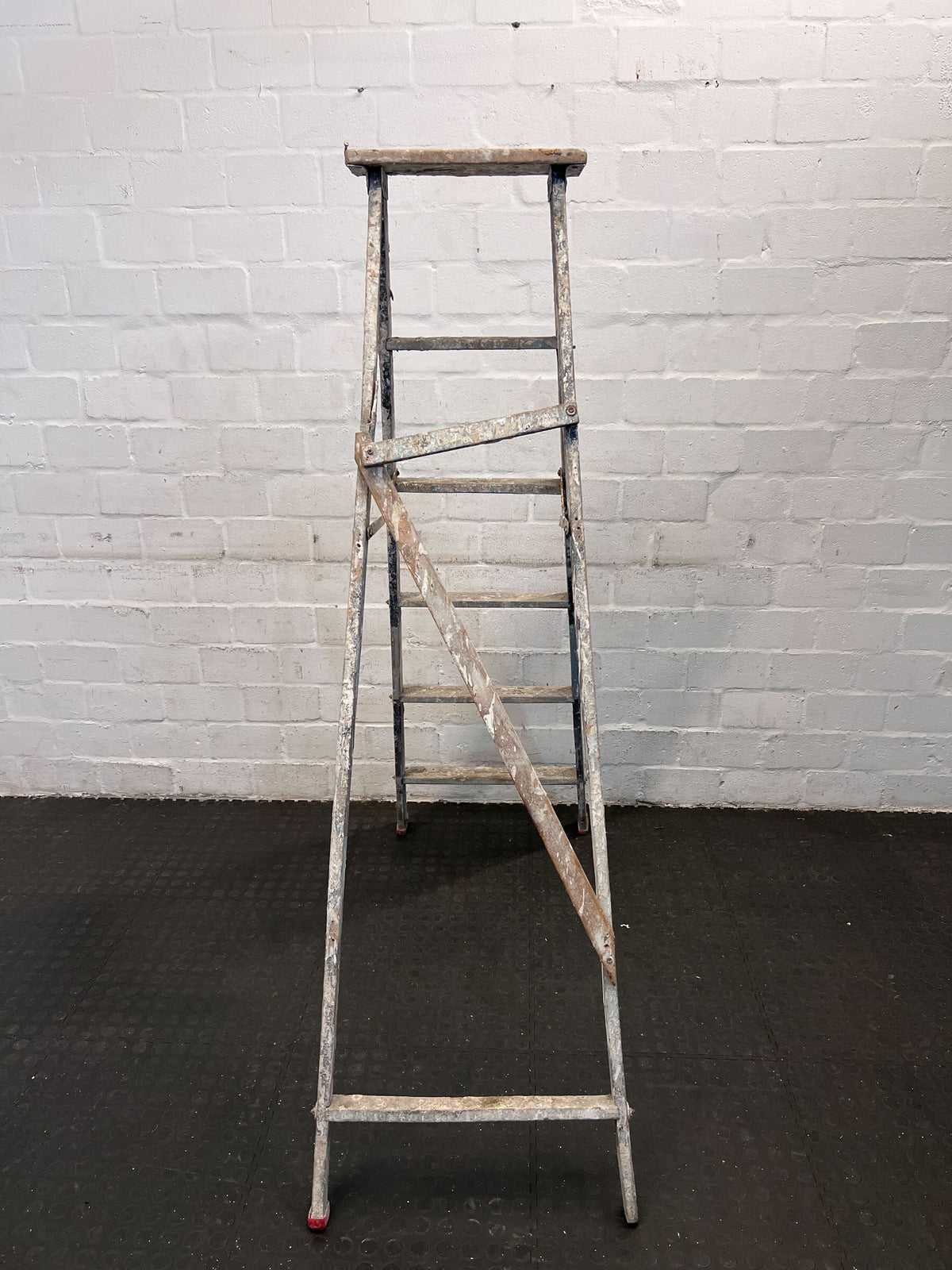Sturdy 6-Step Aluminum Ladder with Minor Paint Stains