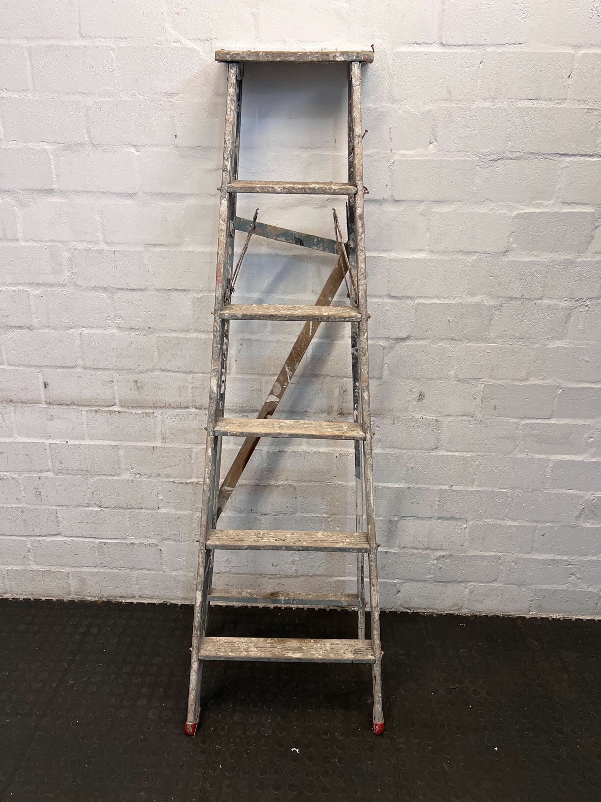Sturdy 6-Step Aluminum Ladder with Minor Paint Stains