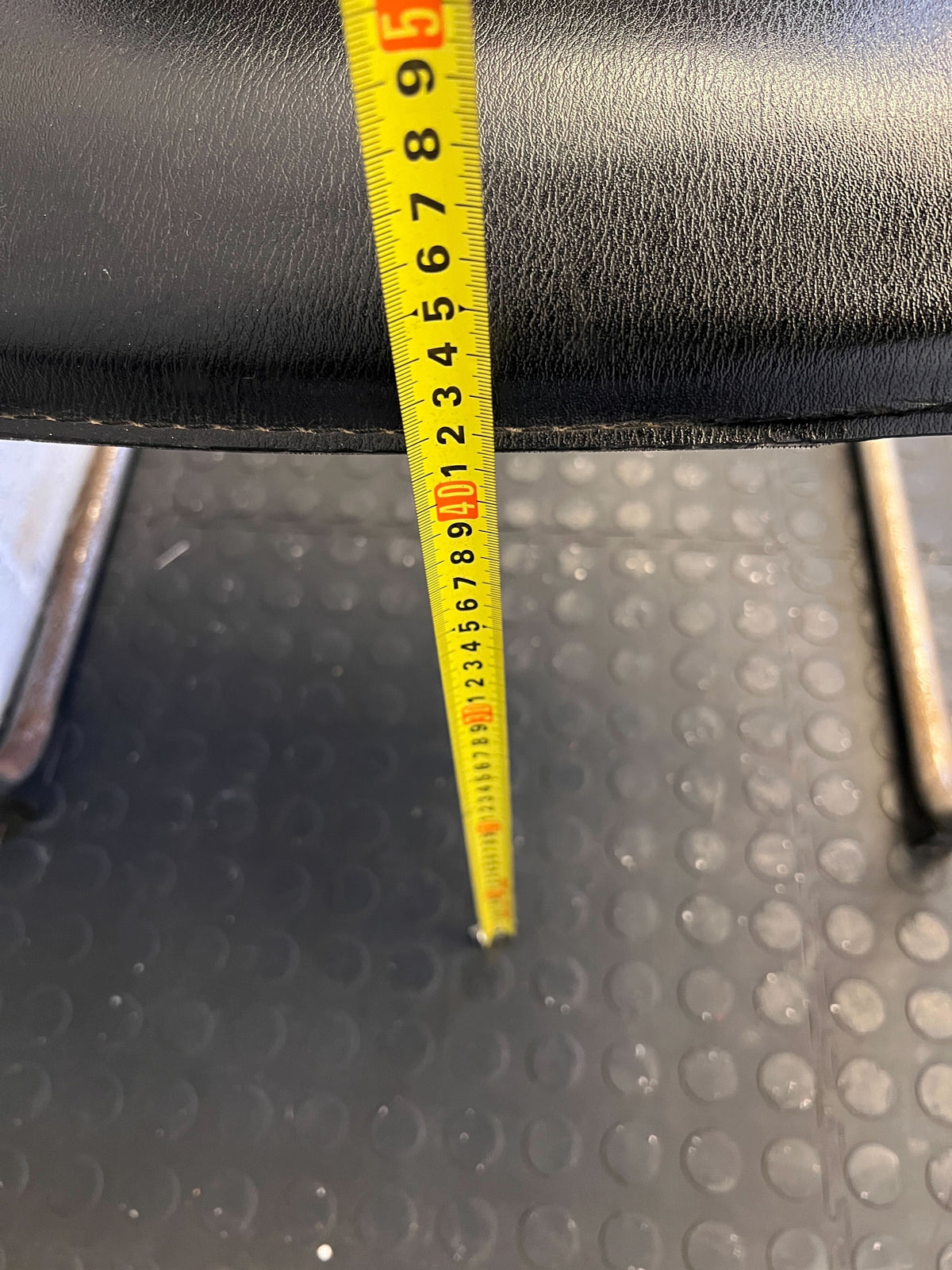 Stylish Black Leather Chair with Chrome Frame – Vintage Appeal Some Rust