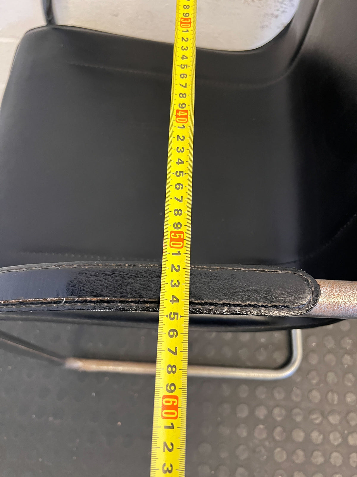 Stylish Black Leather Chair with Chrome Frame – Vintage Appeal Some Rust