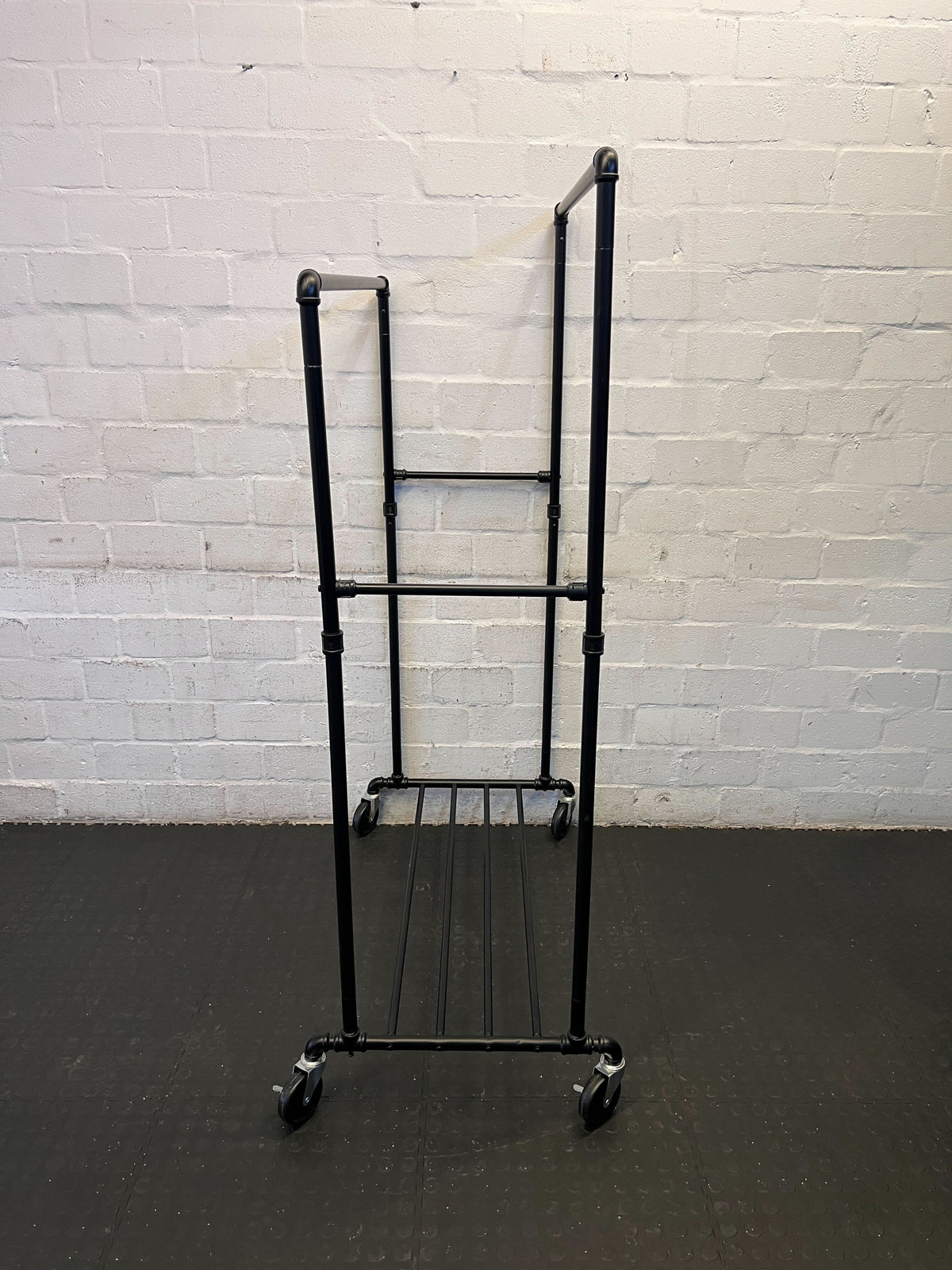 Stylish Black Metal Clothing Rack on Wheels