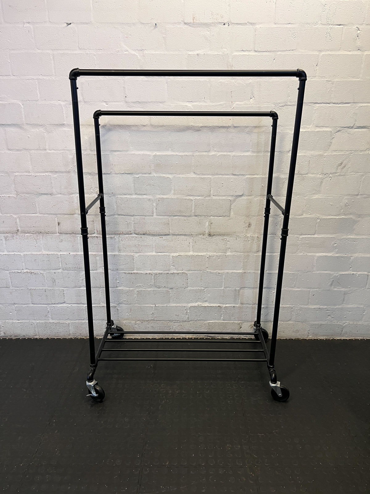 Stylish Black Metal Clothing Rack on Wheels