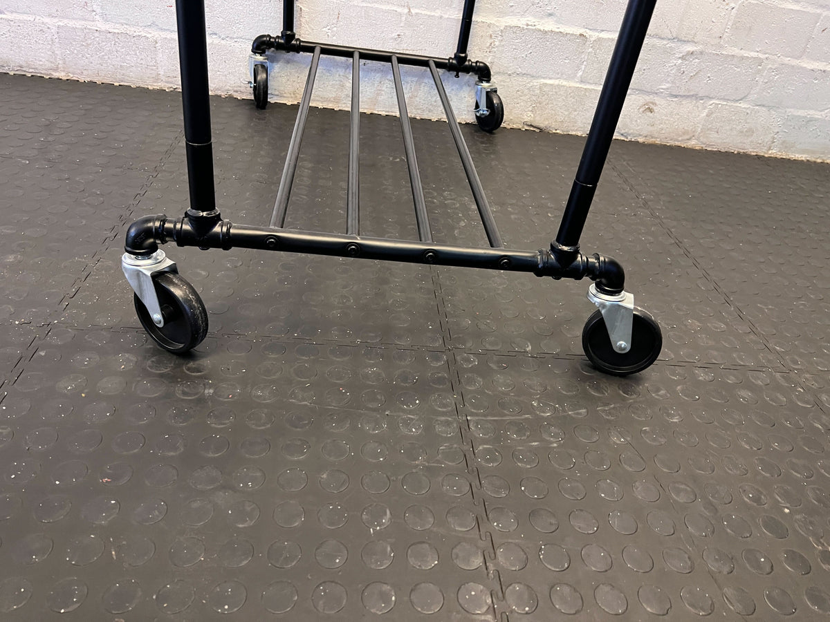 Stylish Black Metal Clothing Rack on Wheels