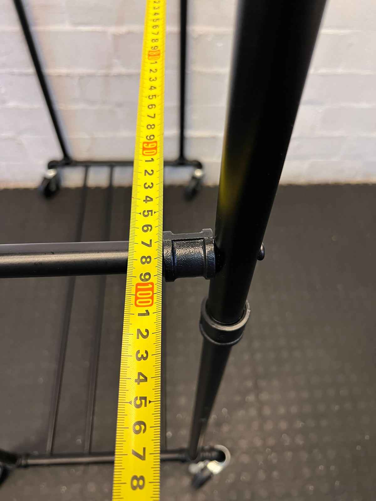 Stylish Black Metal Clothing Rack on Wheels