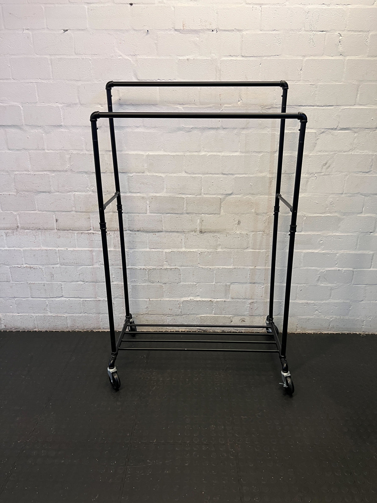 Stylish Black Metal Clothing Rack on Wheels