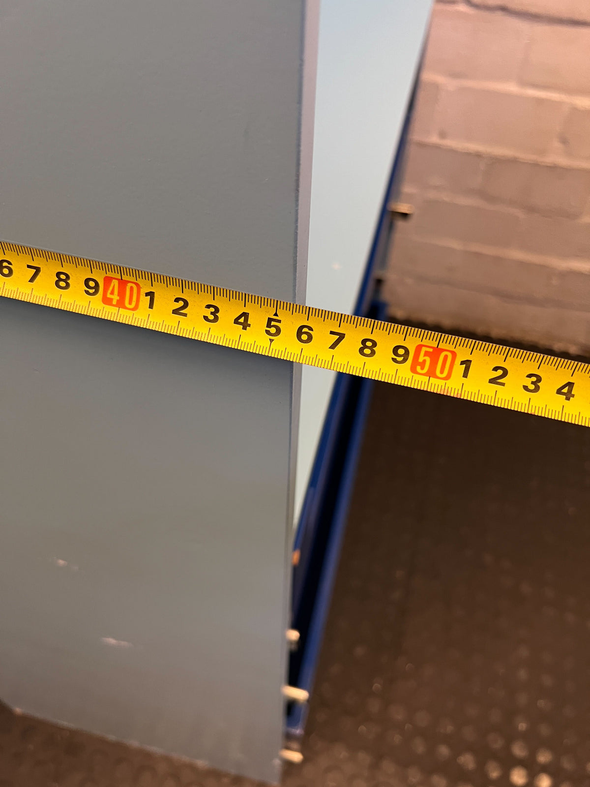 Stylish Blue Storage Cabinet with 4 Drawers and Hanging Rod