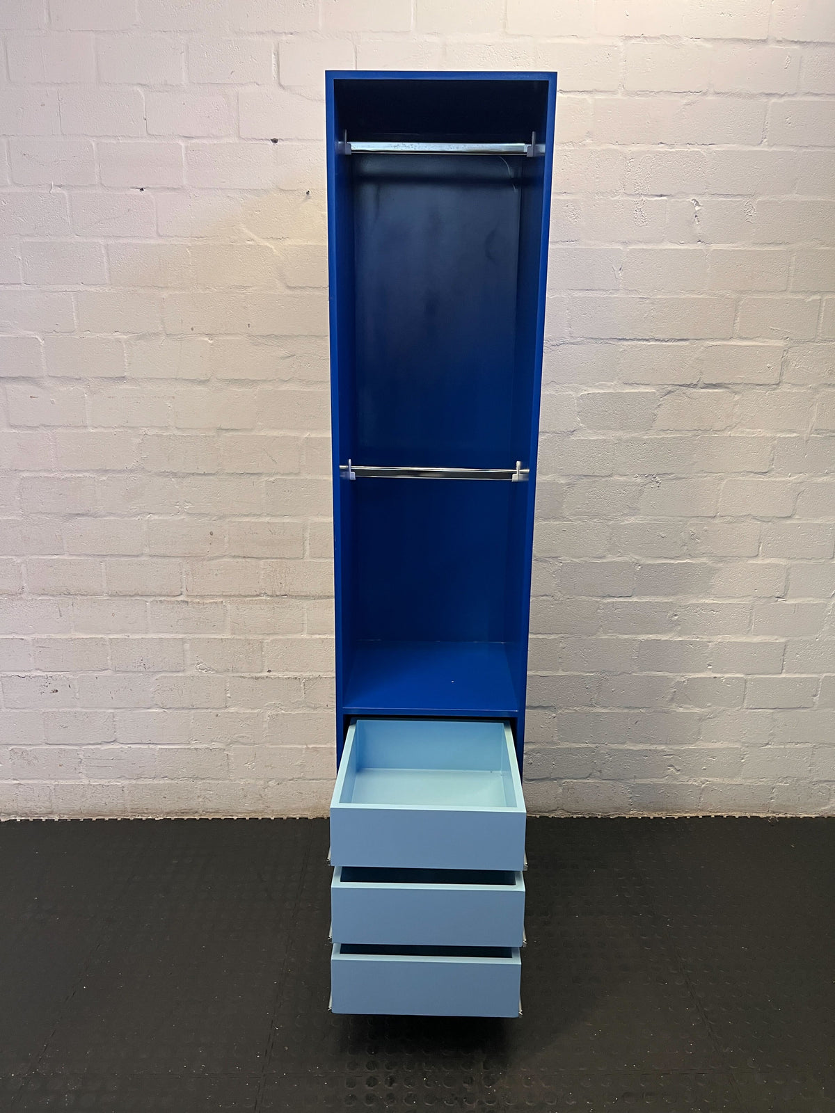 Stylish Blue Storage Unit with Drawers and Hanging Rod