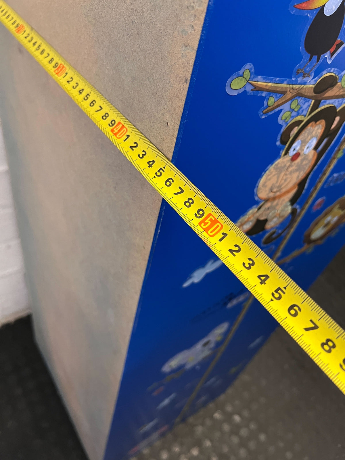 Stylish Blue Storage Unit with Drawers and Hanging Rod