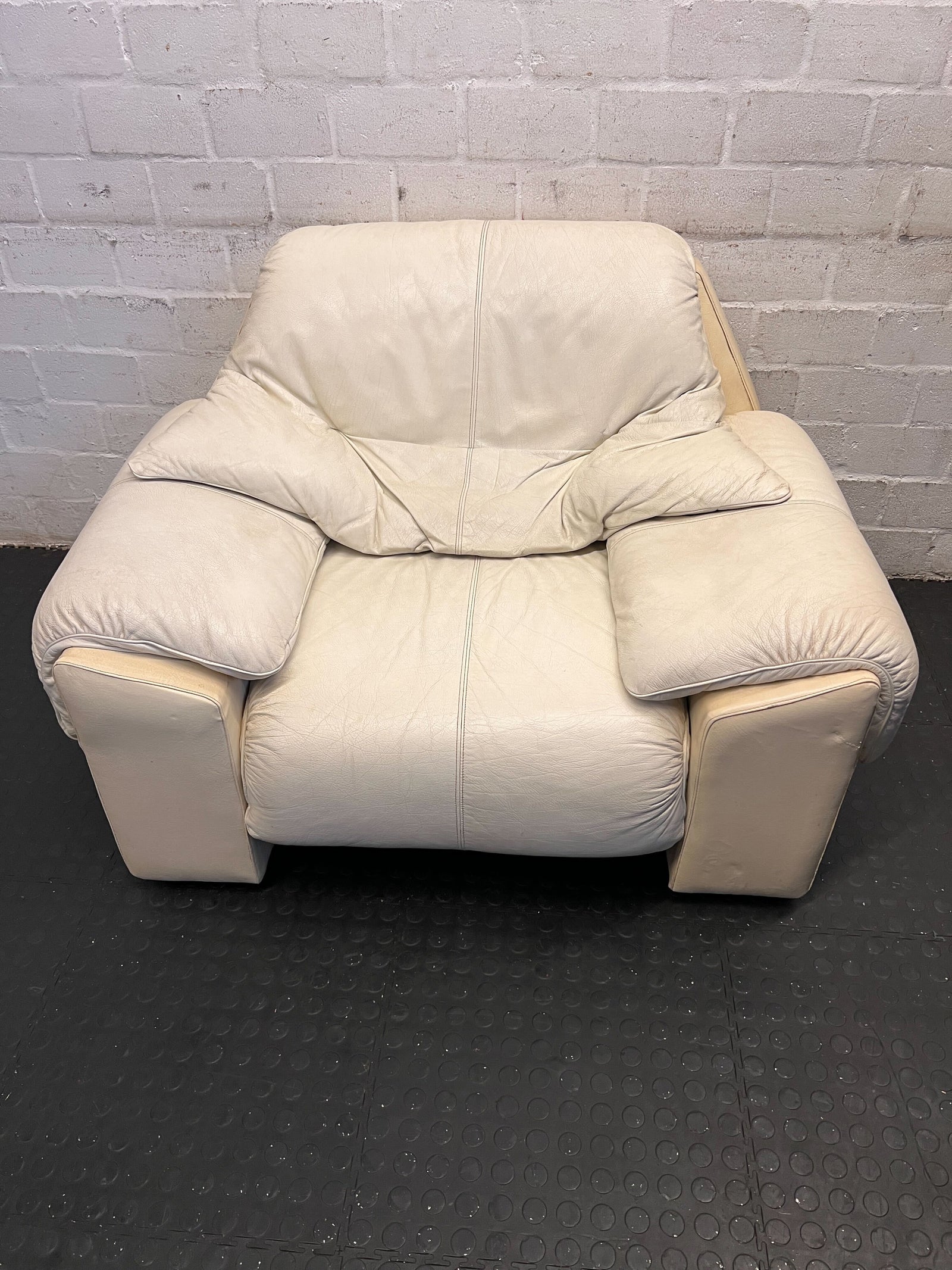 Stylish Cream Leather Armchair with Minor Wear