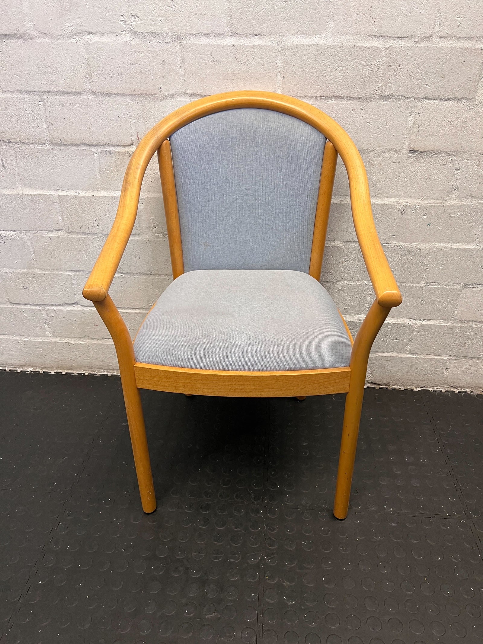 Stylish Light Blue Fabric Armchair with Natural Wood Frame