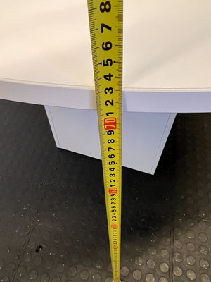 Stylish Round White Table with Modern Design and Minor Scratches