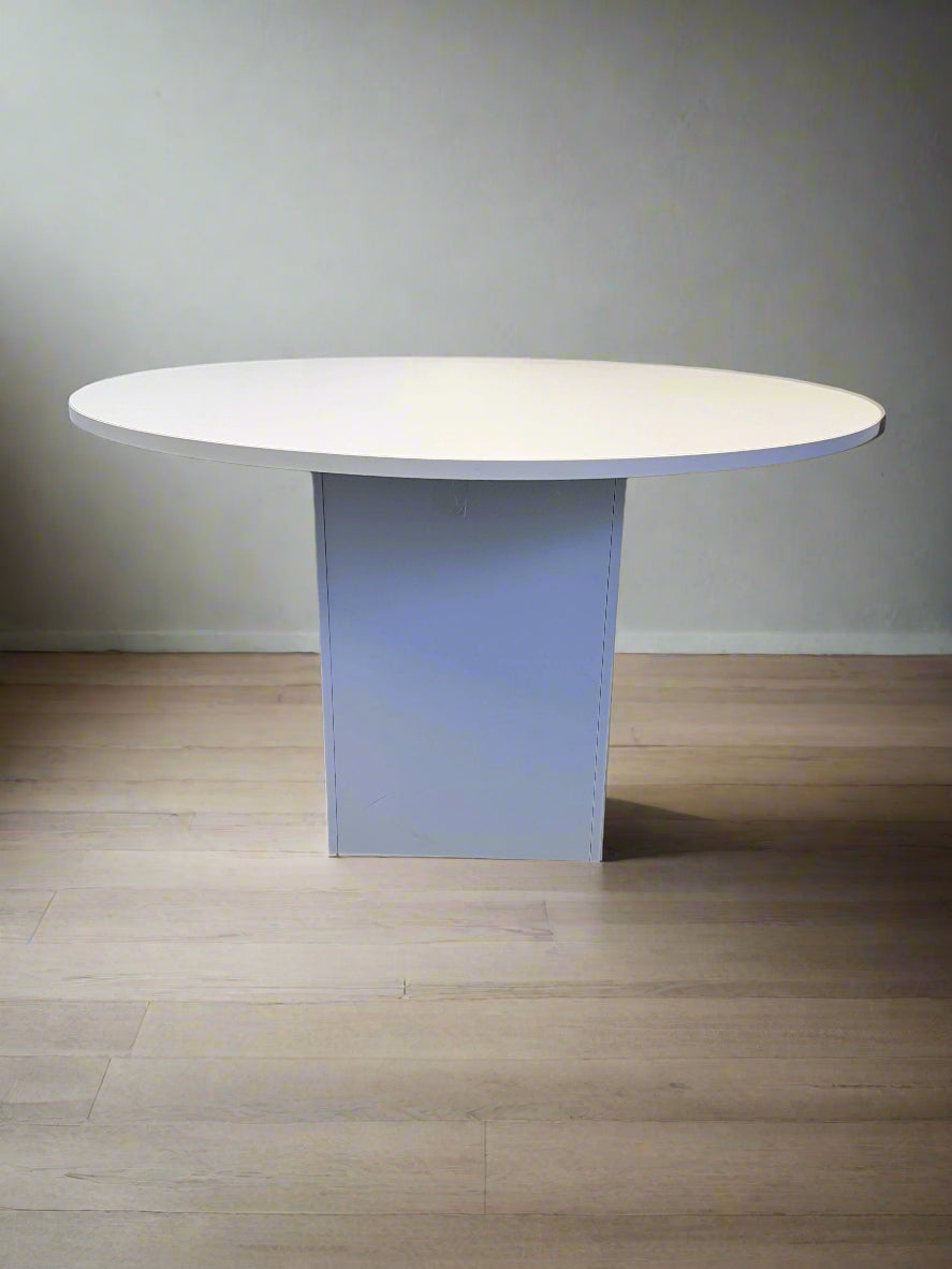 Stylish Round White Table with Modern Design and Minor Scratches