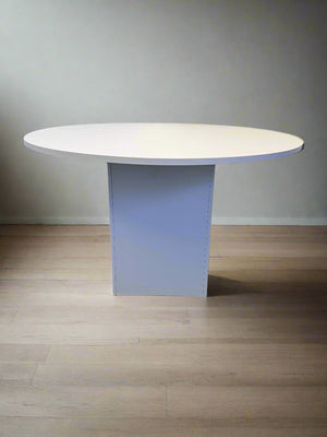 Stylish Round White Table with Modern Design and Minor Scratches