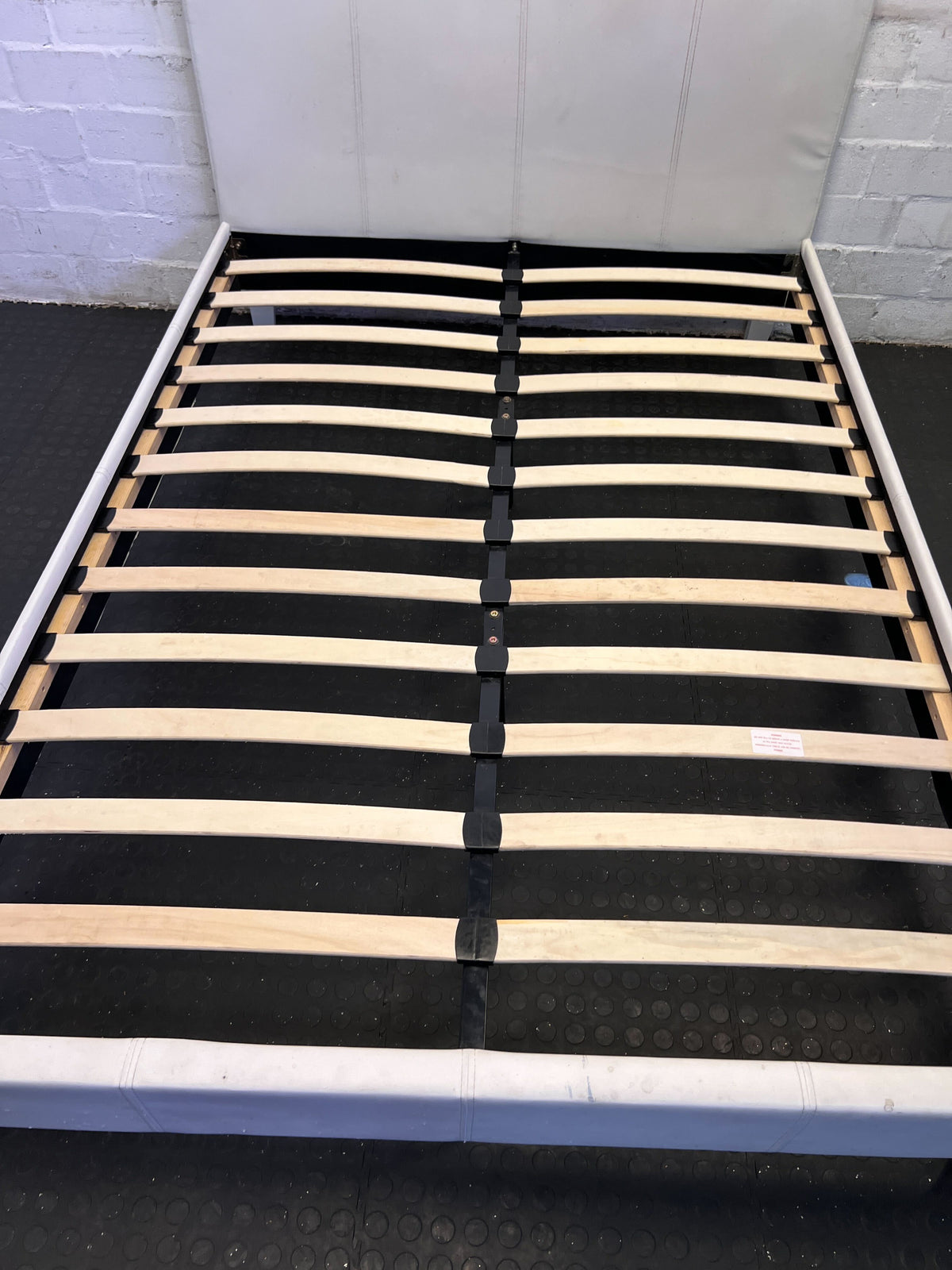 Stylish White Faux Leather Bed Frame with Minor Wear