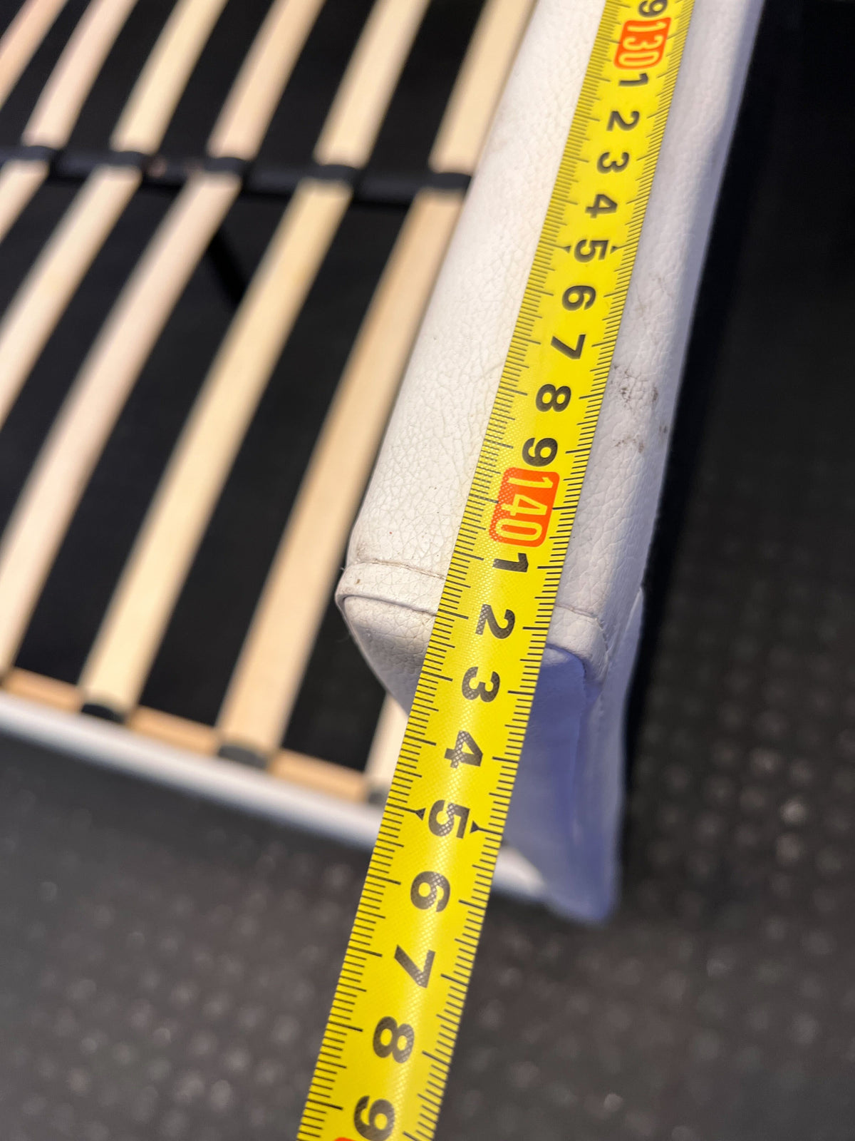 Stylish White Faux Leather Bed Frame with Minor Wear