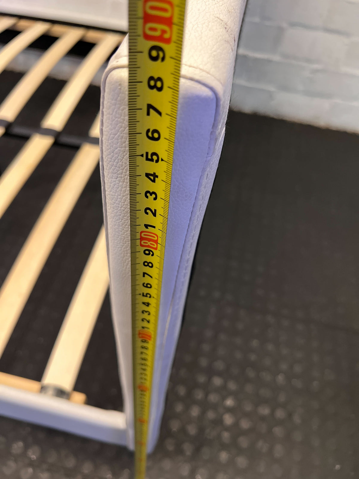 Stylish White Faux Leather Bed Frame with Minor Wear