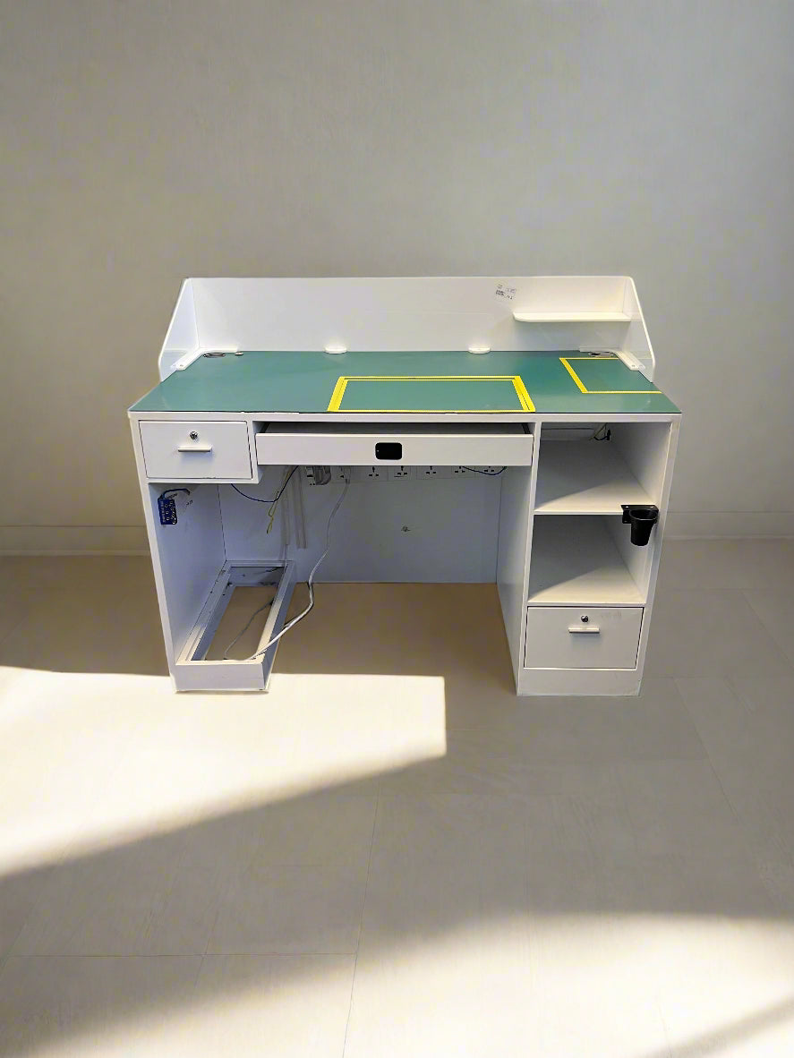 White desk with green top on a white background
