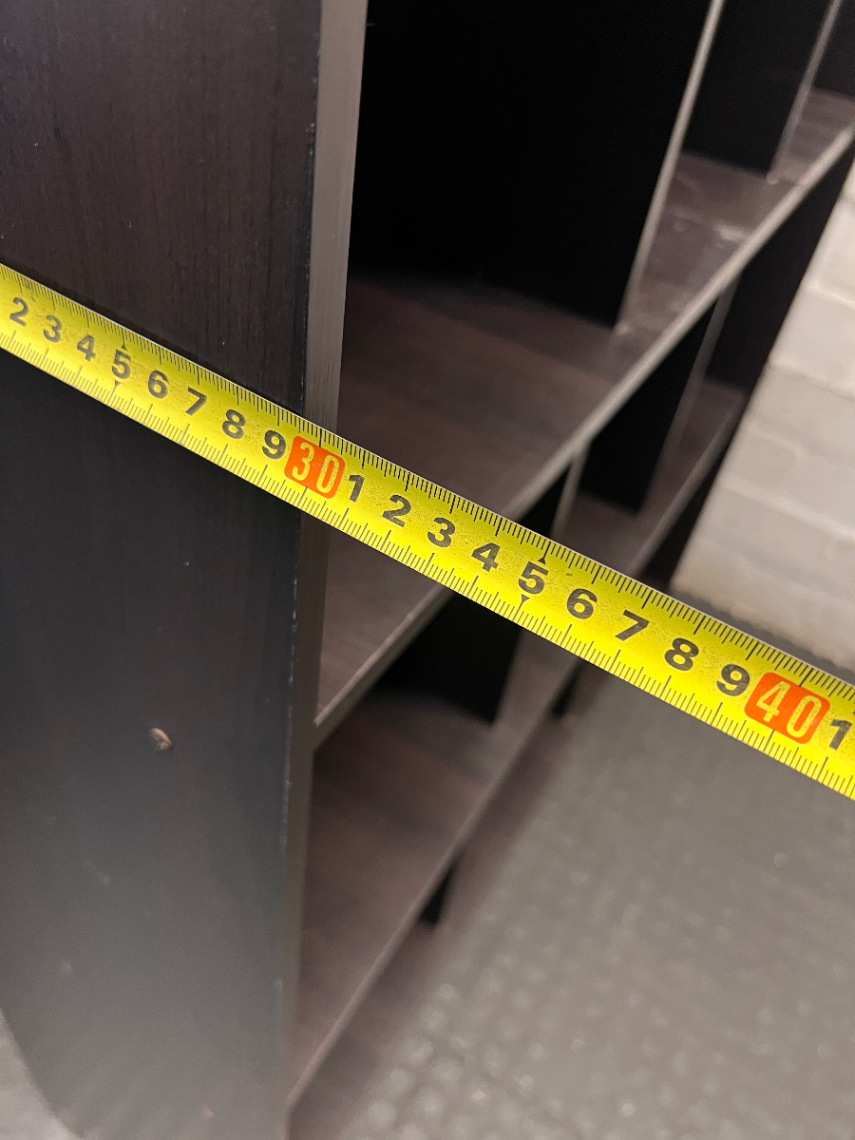 Tall Black 12-Compartment Shelving Unit — Fair Condition with Visible Surface Wear
