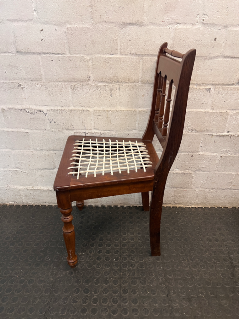 Traditional Brown Wooden Dining Chair with Woven Seat — Overall Good Condition