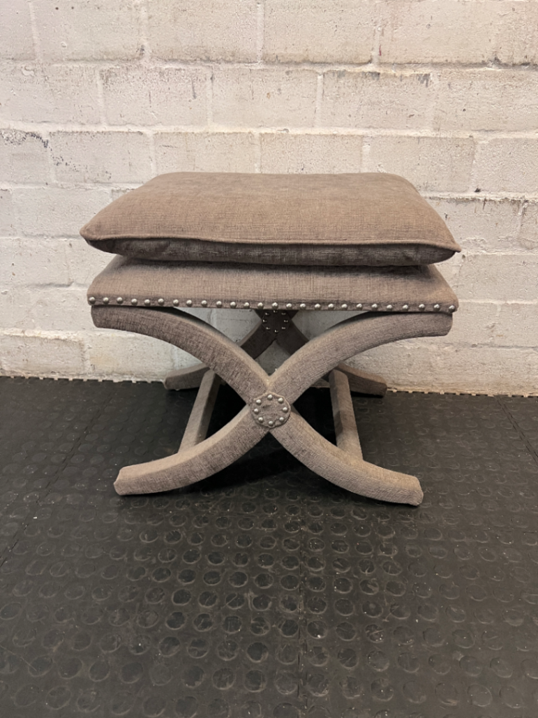 Upholstered X-Frame Ottoman with Nickel Stud Details — Tear and Marker Stains on Top Surface - 2ndhandwarehouse.com