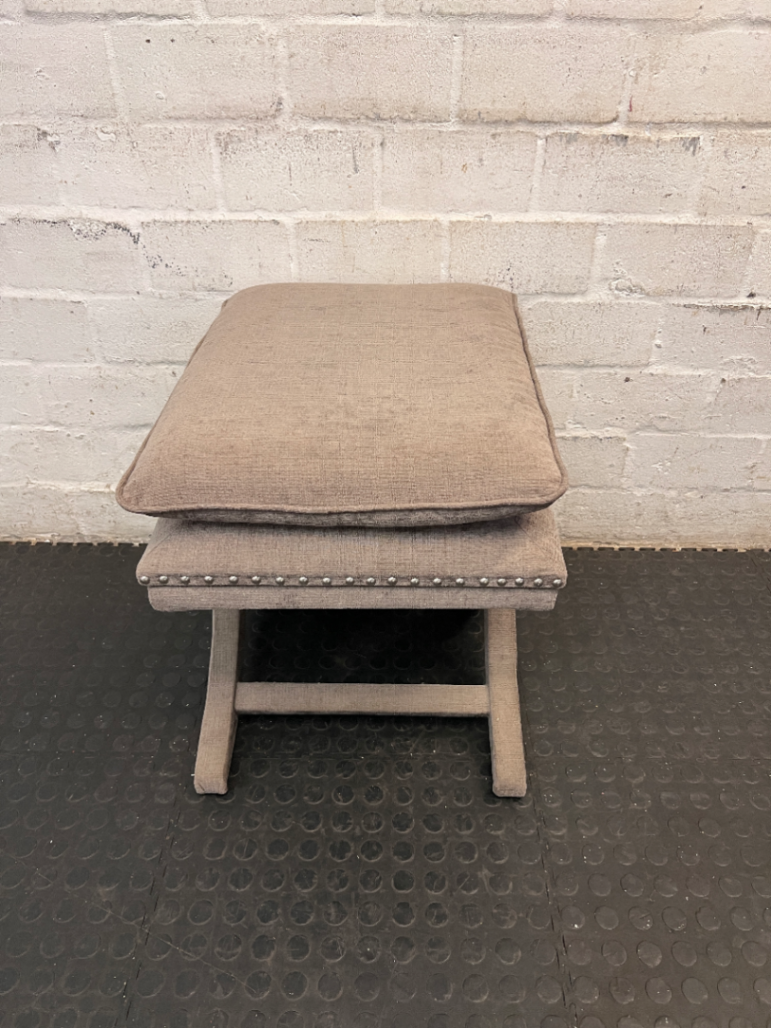 Upholstered X-Frame Ottoman with Nickel Stud Details — Tear and Marker Stains on Top Surface - 2ndhandwarehouse.com