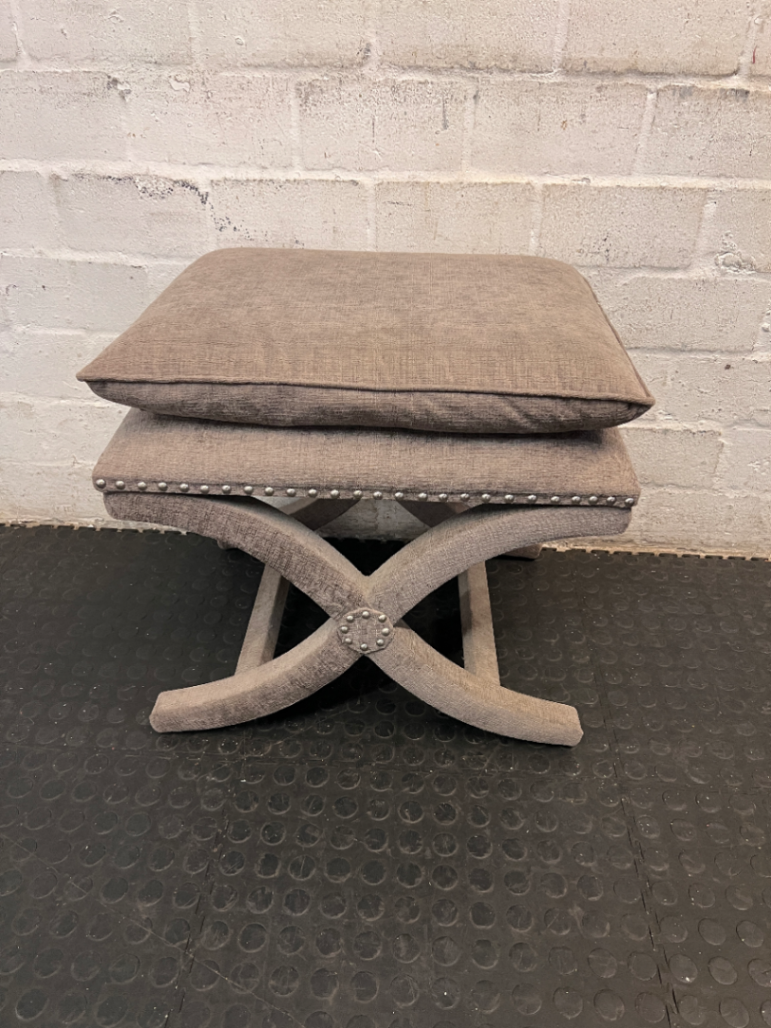 Upholstered X-Frame Ottoman with Nickel Stud Details — Tear and Marker Stains on Top Surface - 2ndhandwarehouse.com
