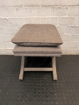 Upholstered X-Frame Ottoman with Nickel Stud Details — Tear and Marker Stains on Top Surface - 2ndhandwarehouse.com