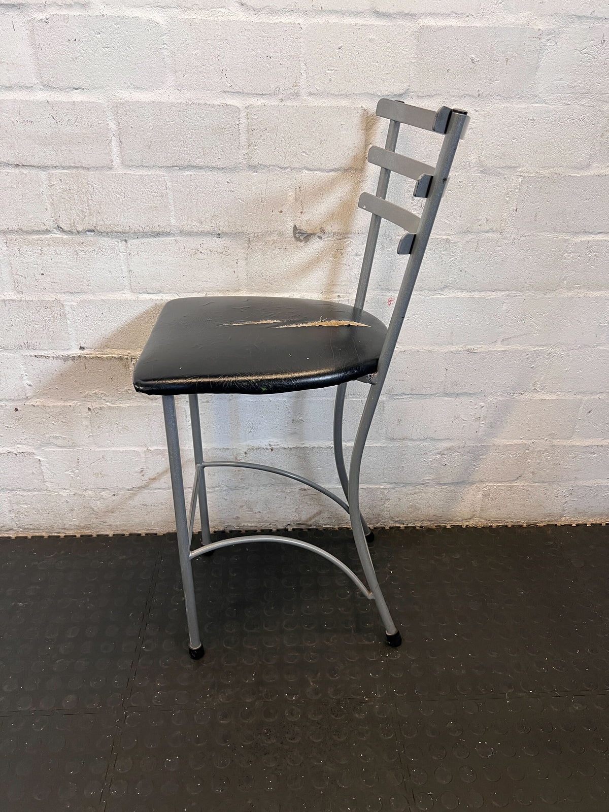 Versatile Grey Metal & Black Seat Chair - Used Condition- Visible damage on the seat