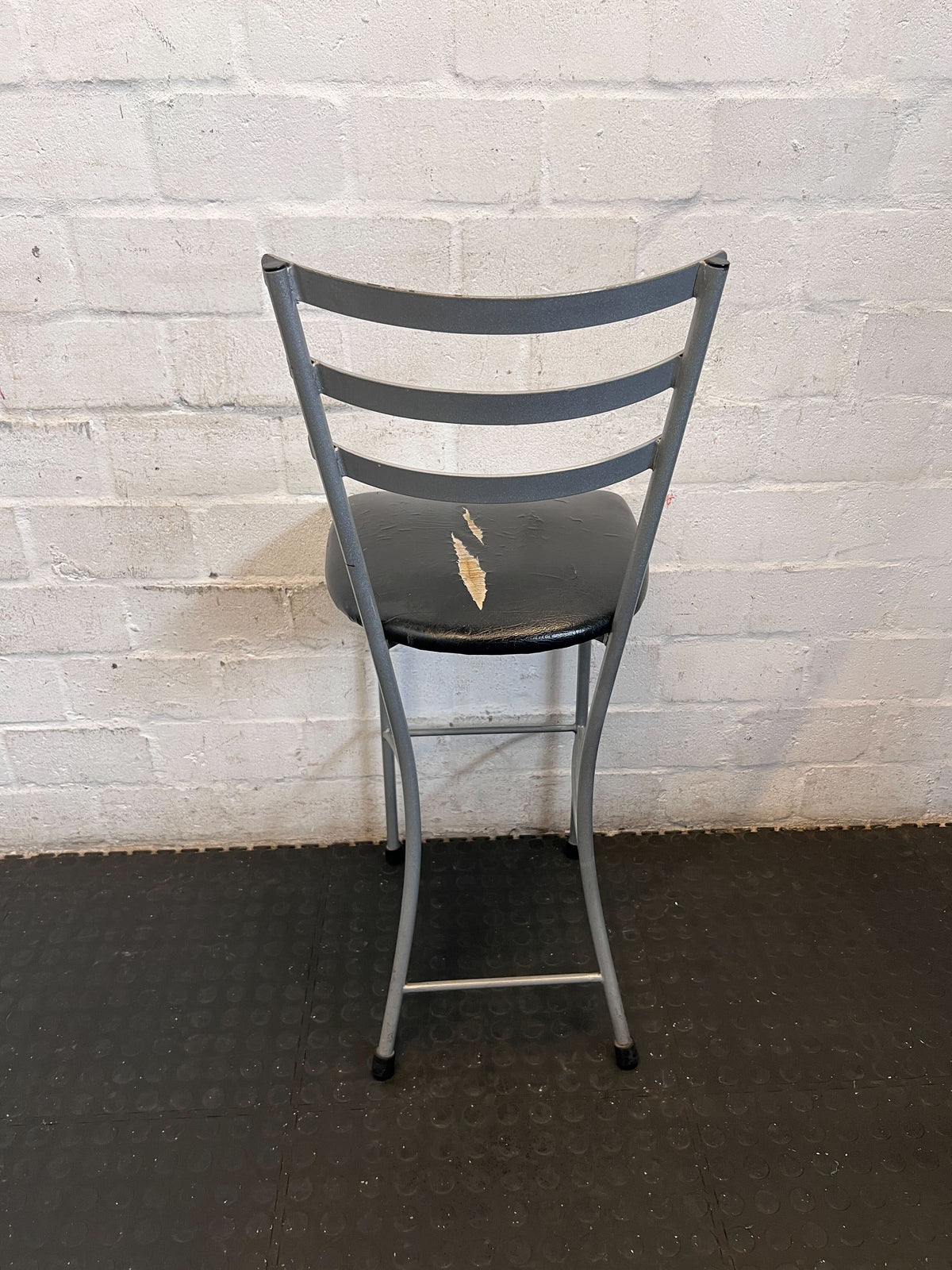 Versatile Grey Metal & Black Seat Chair - Used Condition- Visible damage on the seat