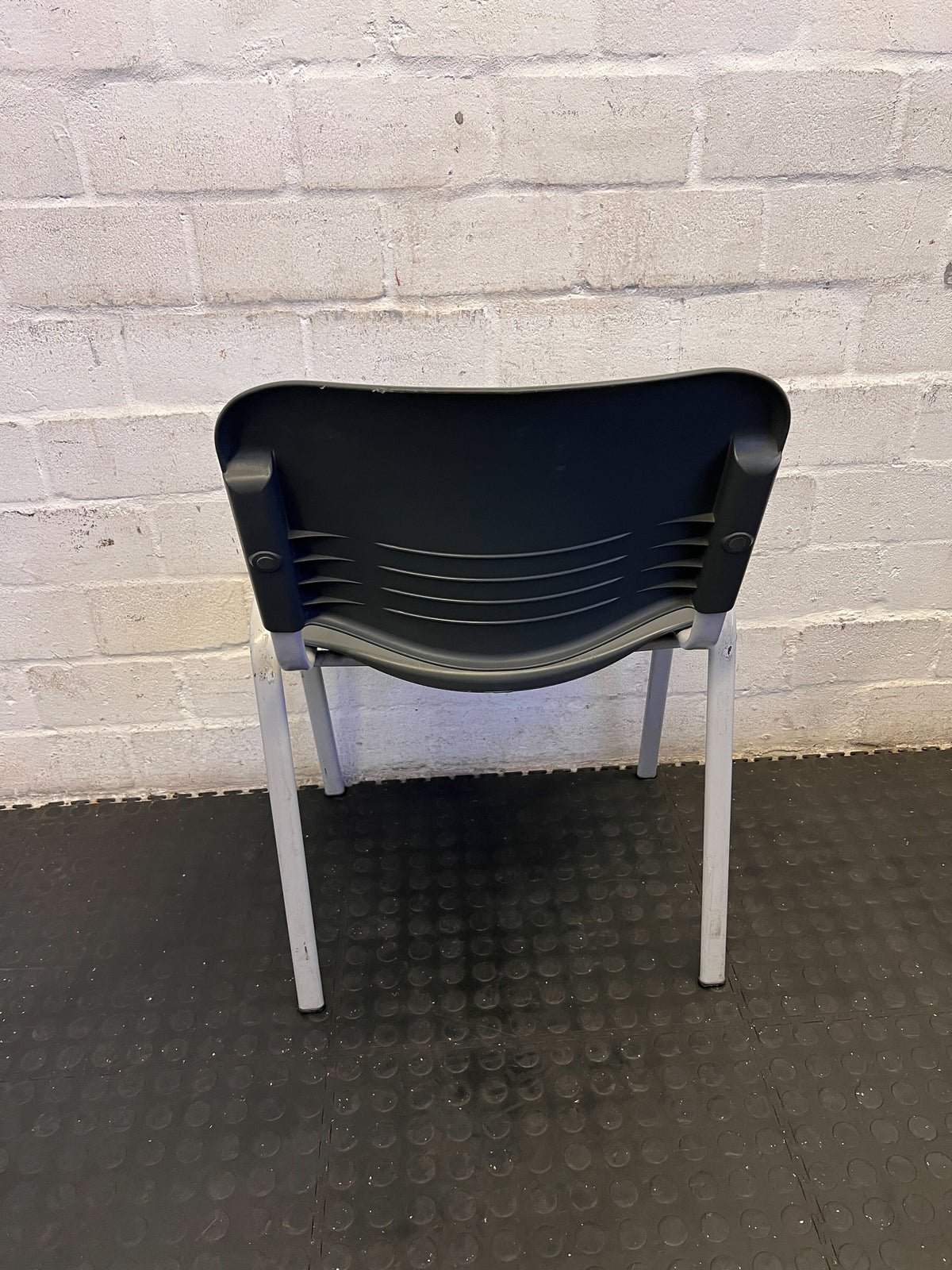 Versatile Grey Stacking Utility Chair