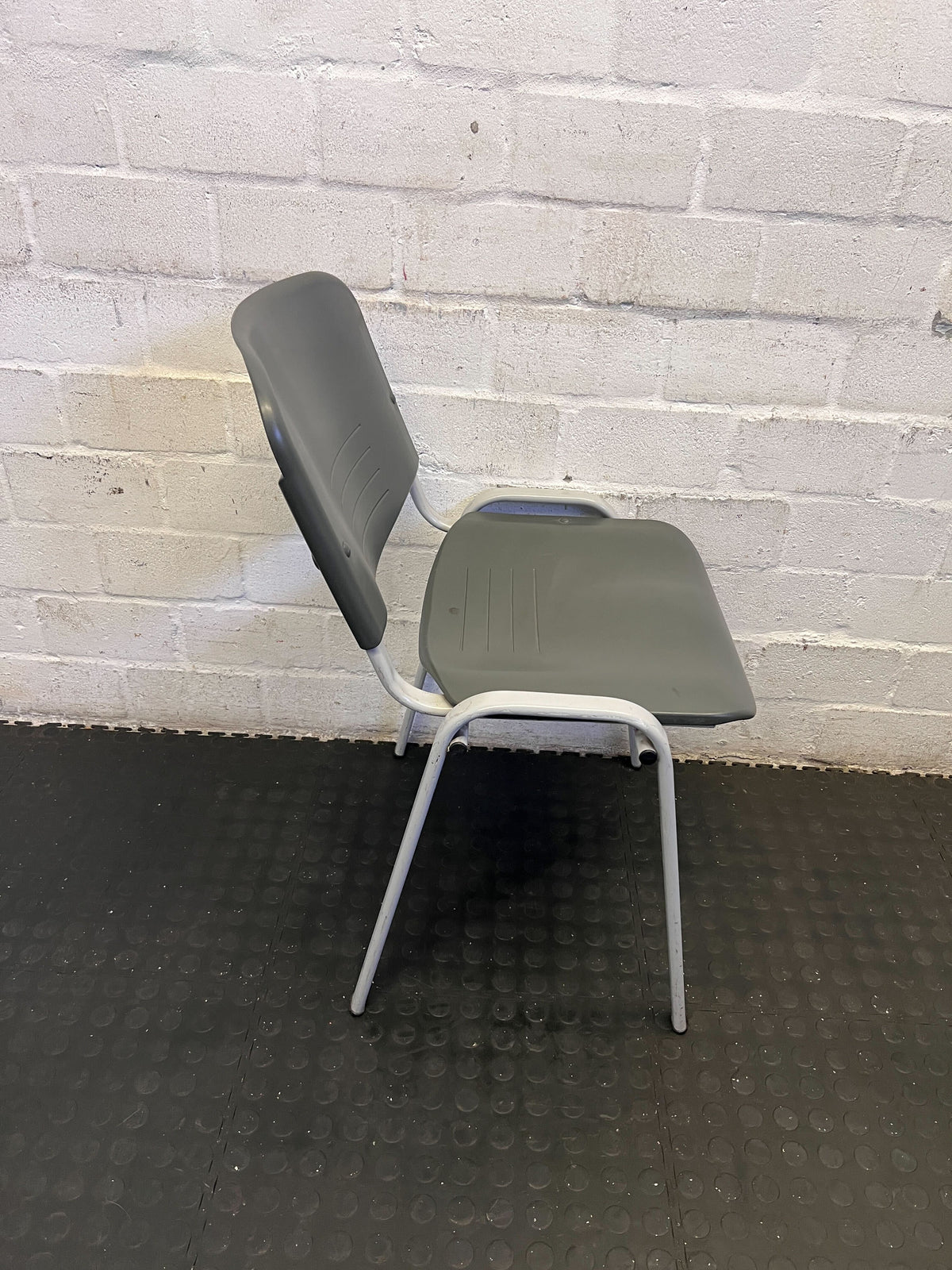 Versatile Grey Stacking Utility Chair