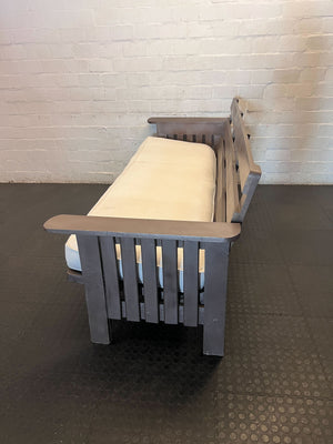 Versatile Wooden Futon Sofa with Cream Cushion