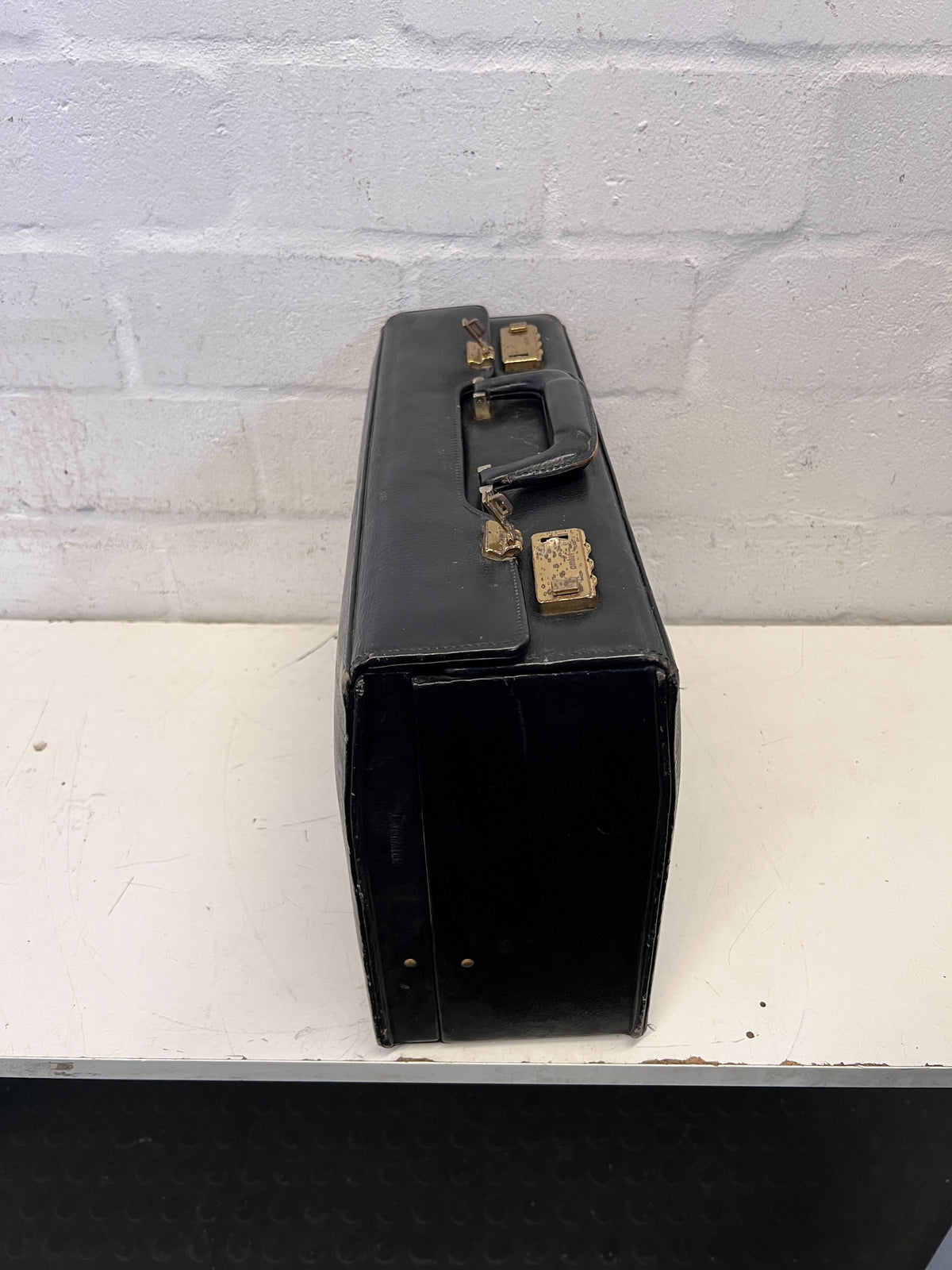 Vintage Black Leather Briefcase with Minor Scratches