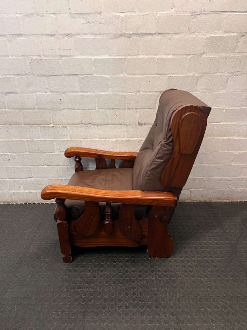 Vintage Brown Vinyl Armchair with Wooden Armrests — Significant Wear and Scratching on Front Edges