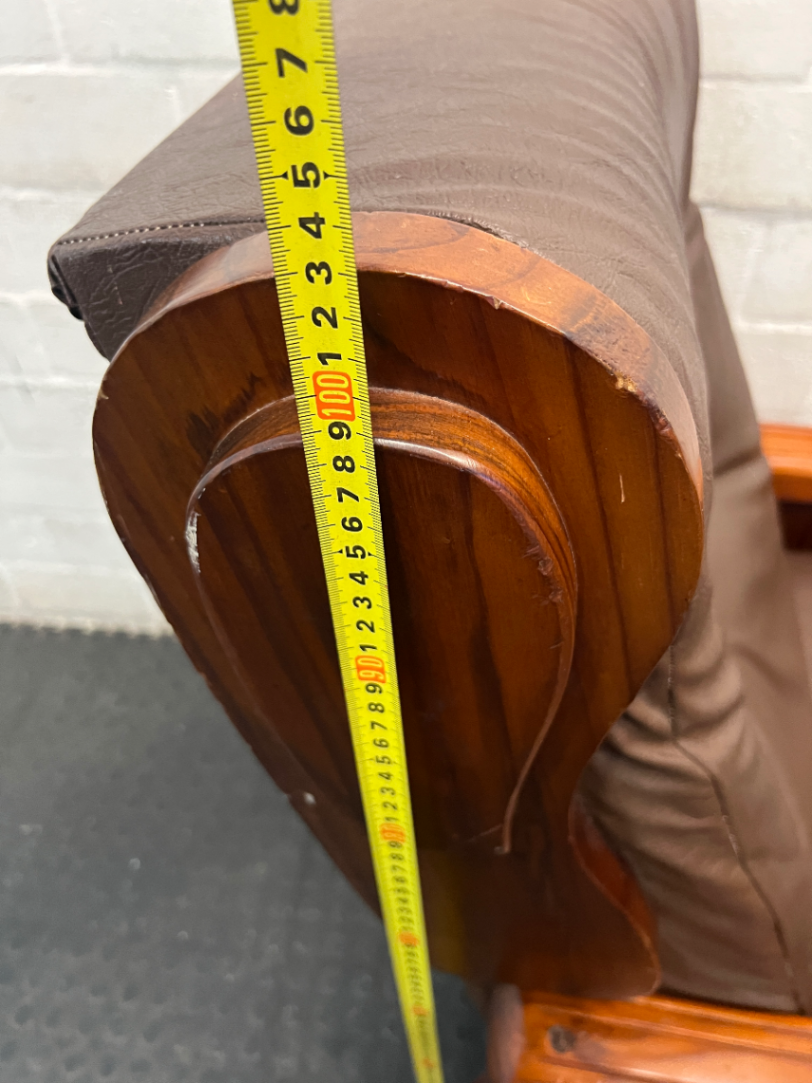 Vintage Brown Vinyl Armchair with Wooden Armrests — Significant Wear and Scratching on Front Edges