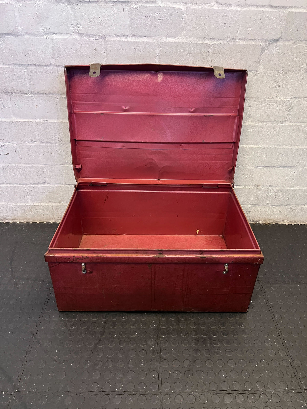 Vintage Red Wooden Storage Trunk with Character and Style