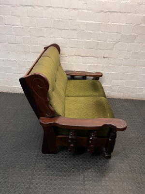 Vintage Style Green Fabric 2 Seater Couch with Wood Frame — Aged State with Scratched Woodwork