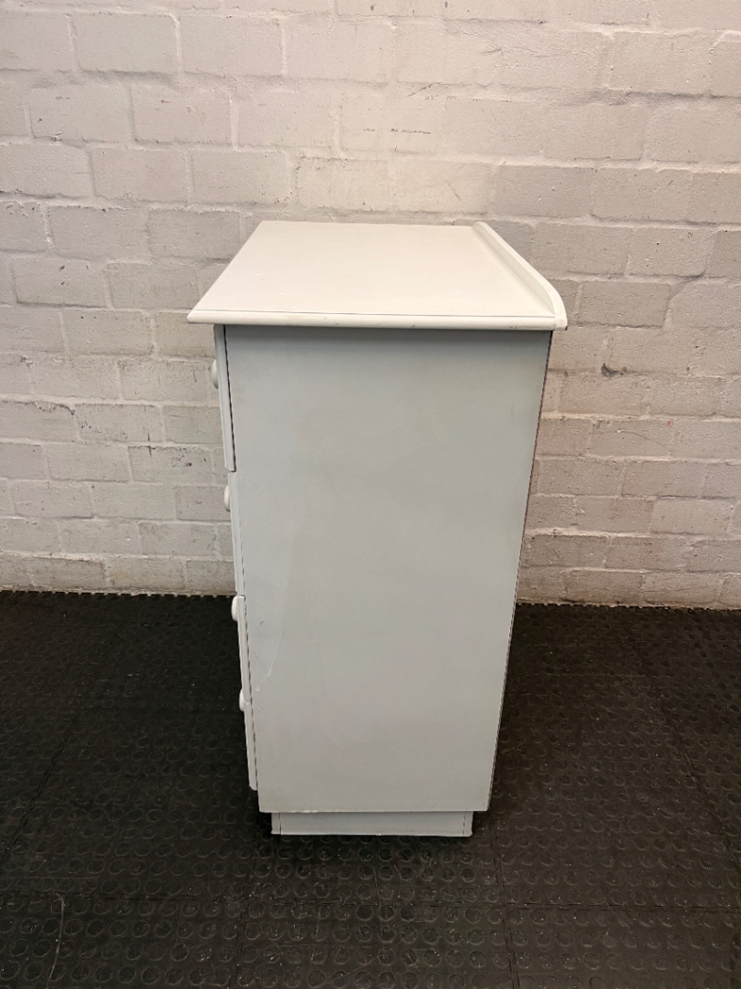 White 4-Drawer Chest with Round Knobs — Worn Paint Finish and Surface Bumps