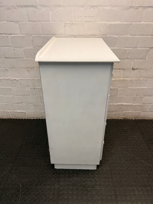 White 4-Drawer Chest with Round Knobs — Worn Paint Finish and Surface Bumps
