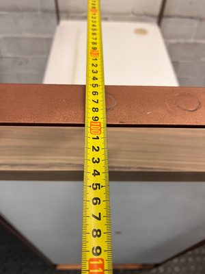 White Manicure Desk with Wood-Tone Trim and Storage — Well Used with Visible Wear