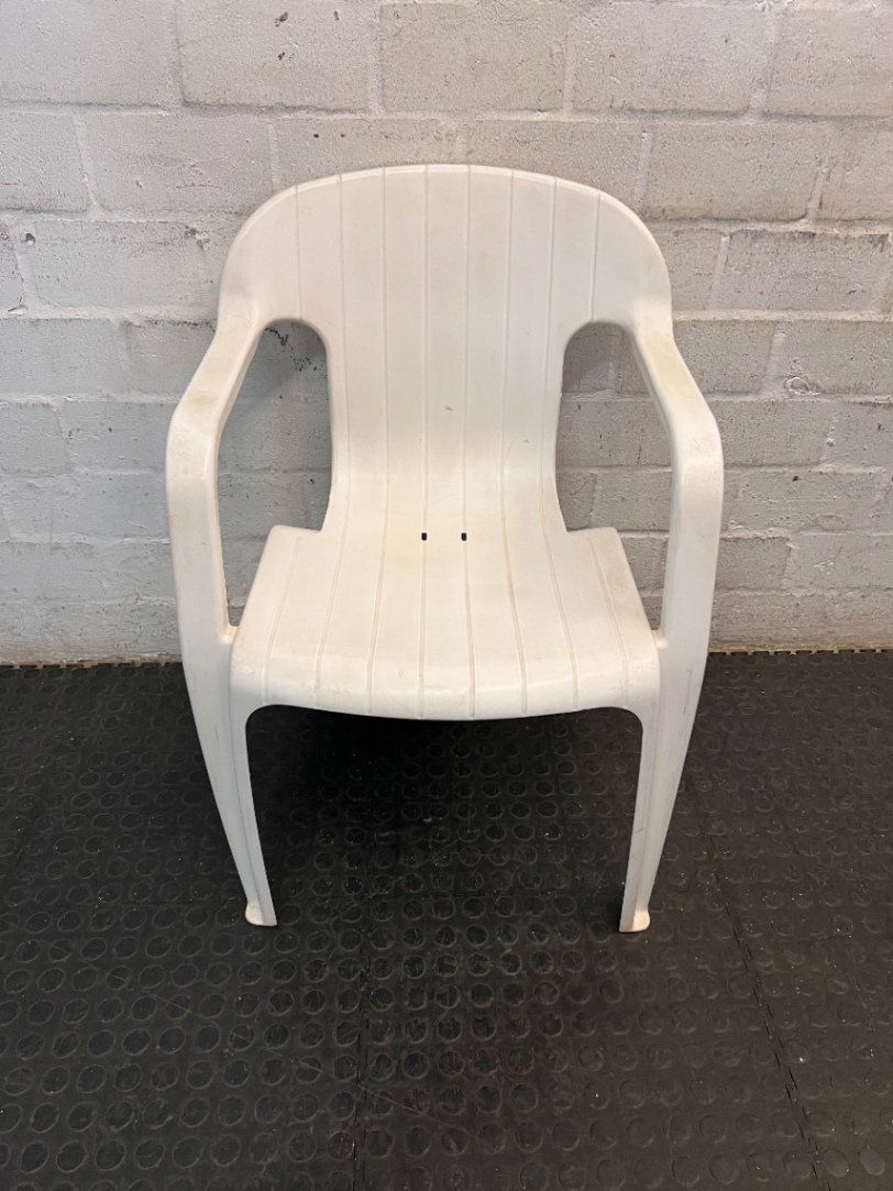 White Moulded Plastic Outdoor Armchair — Surface Wear and Cracks
