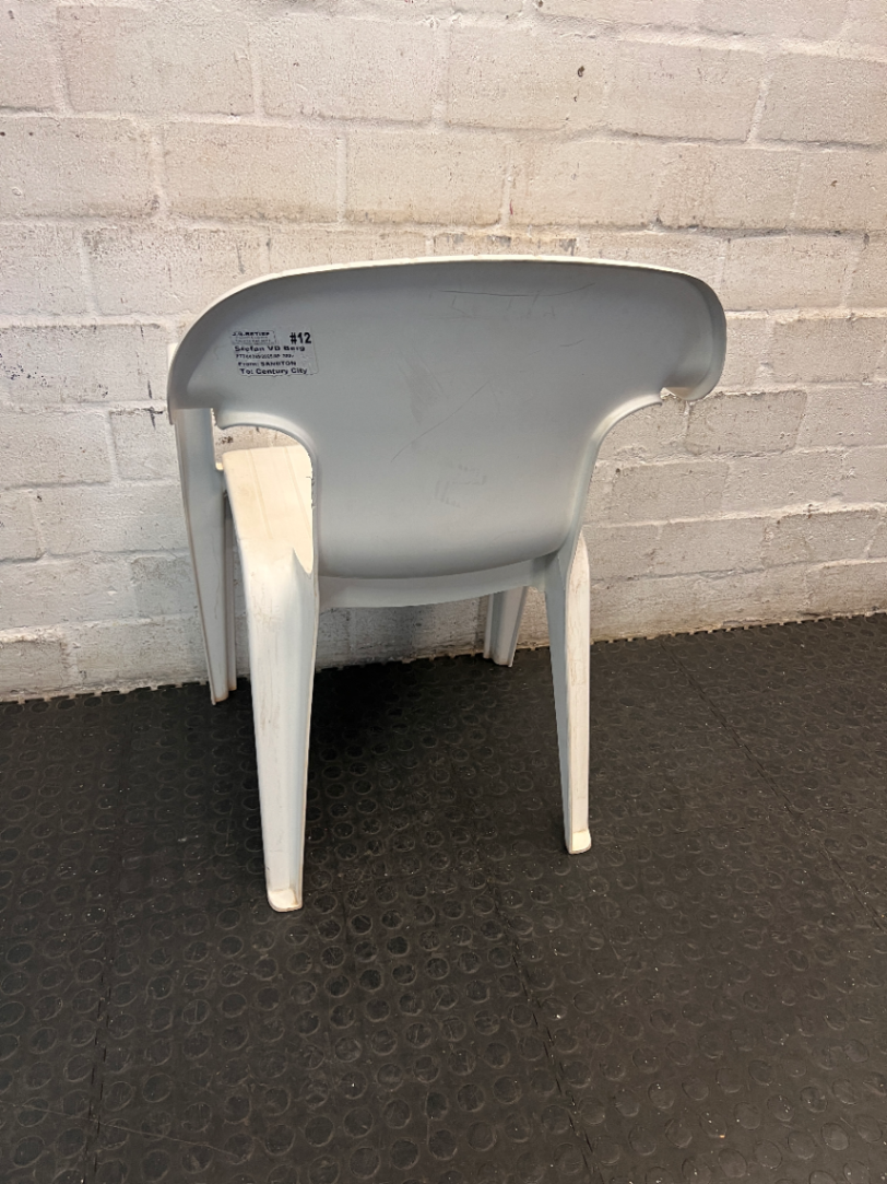 White Moulded Plastic Outdoor Armchair — Surface Wear and Cracks