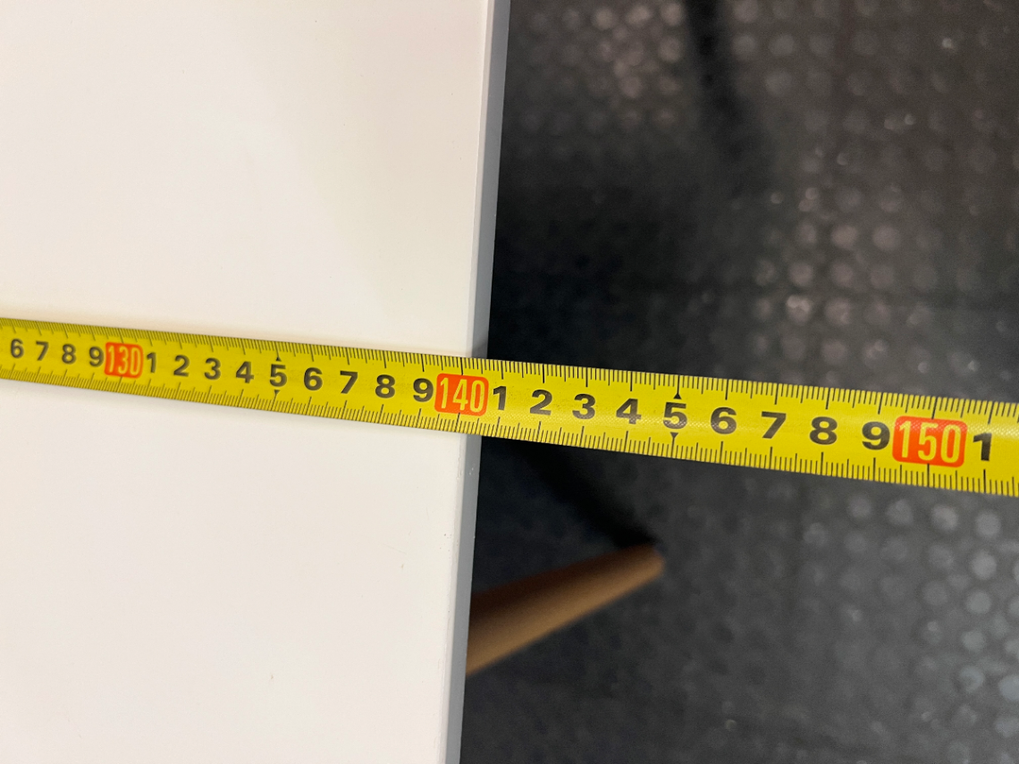 White Rectangular Table with Tapered Wooden Legs — Fair Used Condition