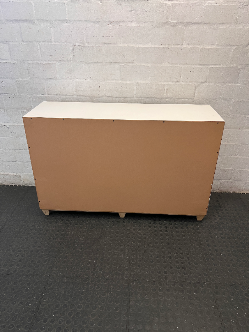 White Storage Cabinet with 4 Drawers and Wood Legs — Small Mark on One Drawer Face