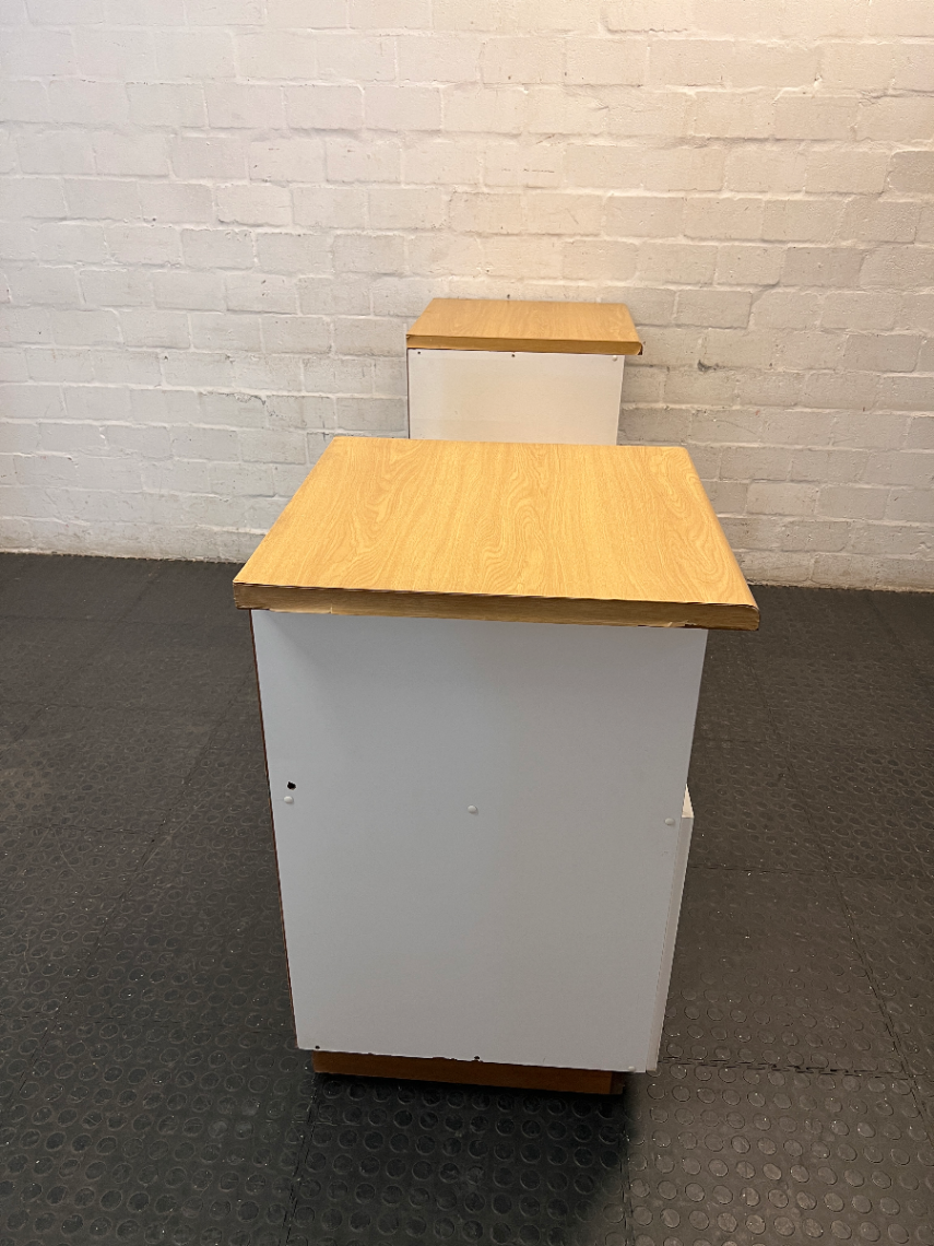 White and Oak-Toned Tiered TV Unit with Cupboards — Used; Fair Condition