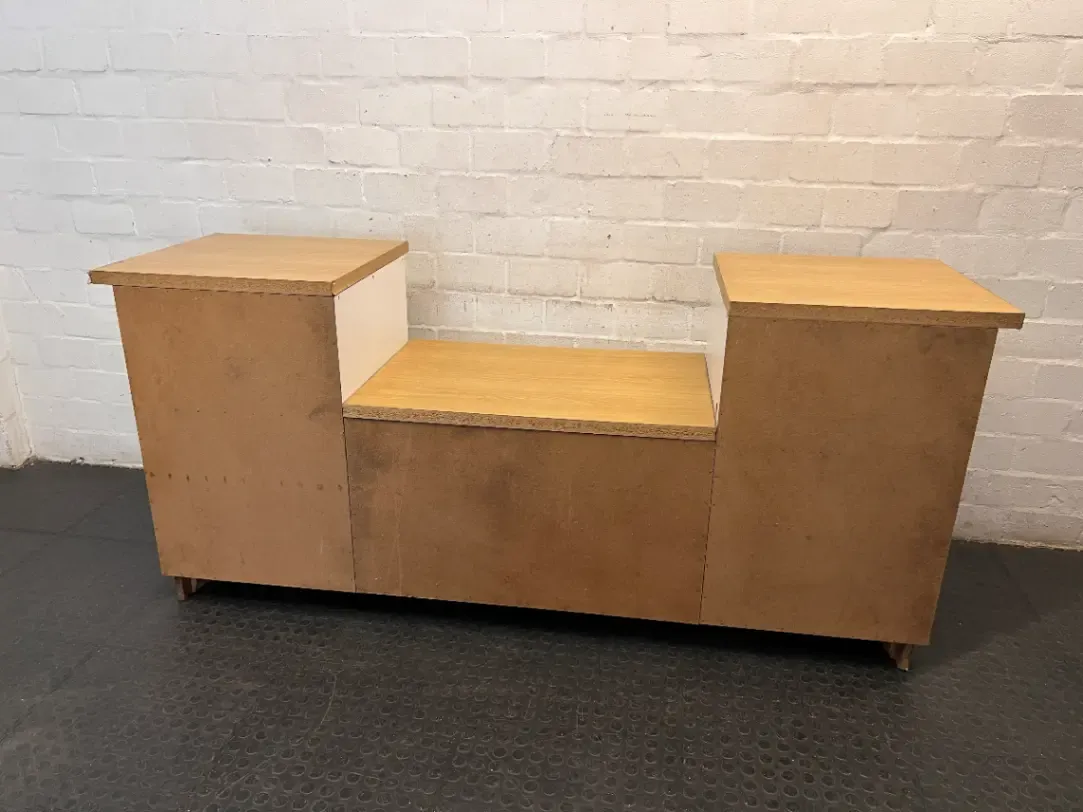 White and Oak-Toned Tiered TV Unit with Cupboards — Used; Fair Condition
