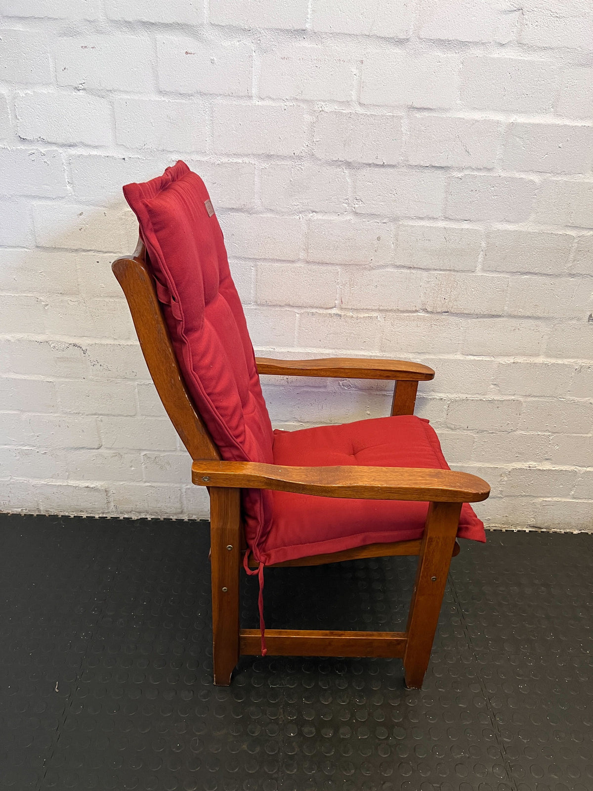 Wooden Dining Chair With A Cozy Red Upholstered Cushion