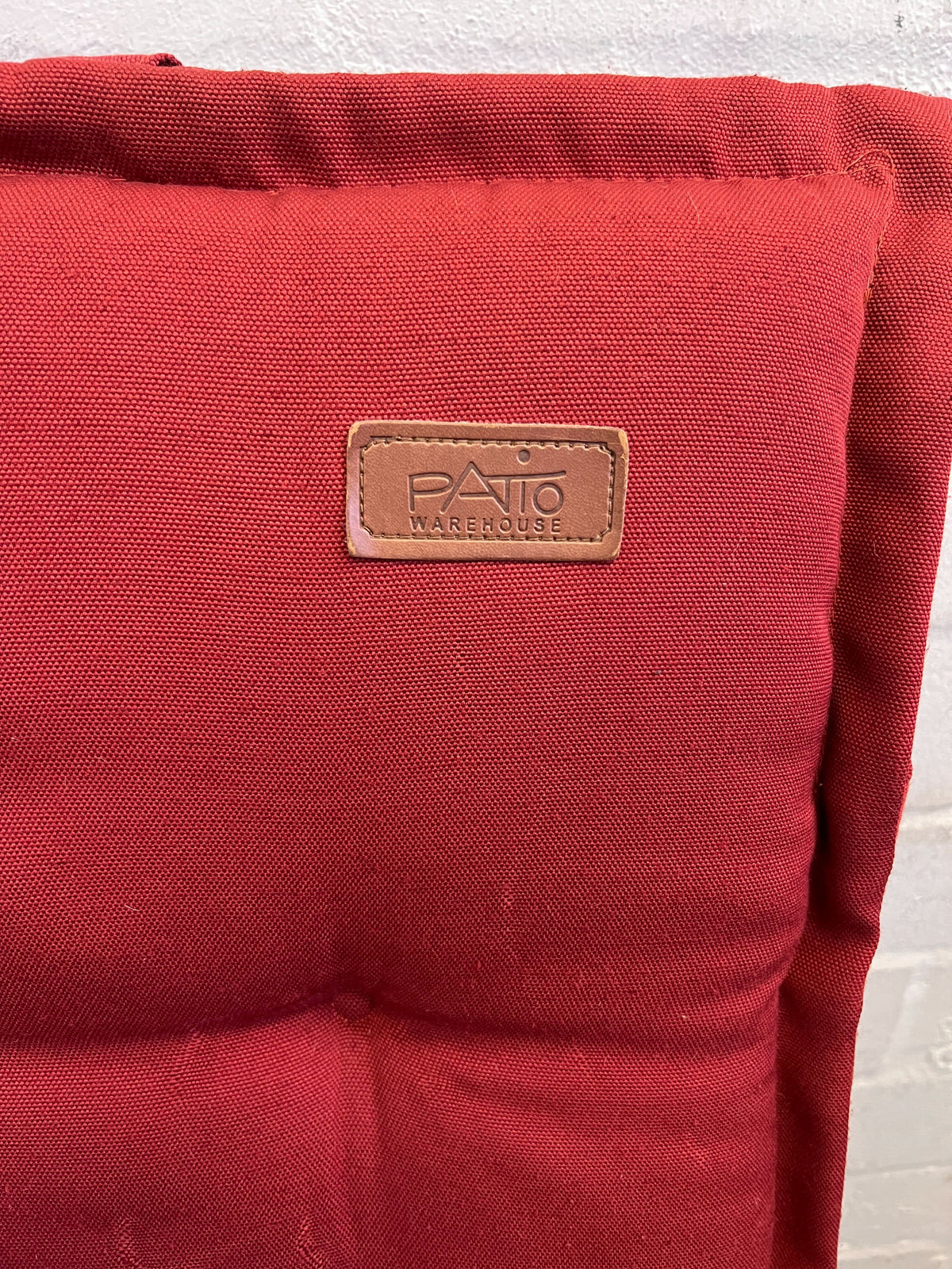 Wooden Dining Chair With A Cozy Red Upholstered Cushion